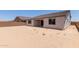 The backyard offers a blank canvas with space for landscaping and outdoor activities at 23724 N 165Th Dr, Surprise, AZ 85387