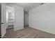 Large bedroom with a walk-in closet, neutral carpet, and plenty of space at 23724 N 165Th Dr, Surprise, AZ 85387