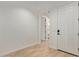 Bright entryway features tile flooring, neutral walls, and clear views into the home's layout at 23724 N 165Th Dr, Surprise, AZ 85387