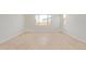 Bright, modern living room featuring beautiful tile floors and large windows for natural light at 23724 N 165Th Dr, Surprise, AZ 85387