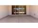 A covered patio with sliding glass doors provides seamless indoor-outdoor living at 23724 N 165Th Dr, Surprise, AZ 85387