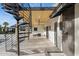 Gorgeous outdoor patio with spiral staircase, ceiling fans, and modern finishes at 4316 N 86Th Pl, Scottsdale, AZ 85251