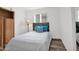 Serene bedroom with bright decor, wood headboard, and cozy bedding for a relaxing retreat at 5424 S 15Th St, Phoenix, AZ 85040
