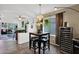 Charming dining area with elegant lighting and comfortable seating at 5424 S 15Th St, Phoenix, AZ 85040