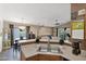 Bright kitchen with stainless steel sink, modern appliances, and open layout into the dining and living areas at 5424 S 15Th St, Phoenix, AZ 85040