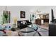 Cozy living room featuring a plush sofa and stylish decor at 5424 S 15Th St, Phoenix, AZ 85040