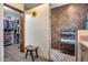 Modern bathroom featuring a beautiful chevron tiled shower, custom bench, and walk-in closet at 8246 W Melinda Ln, Peoria, AZ 85382