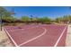 Outdoor basketball court with painted lines and hoops in a community park at 3038 W Woburn Ln, Phoenix, AZ 85085