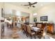 Open concept to kitchen with formal dining space featuring a beautiful wooden table at 7723 E Visao Dr, Scottsdale, AZ 85266