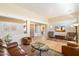 Bright living room with hardwood floors, neutral walls, and elegant furnishings at 7723 E Visao Dr, Scottsdale, AZ 85266