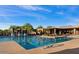 Inviting community pool with clear blue water, comfortable lounge chairs, and a relaxing atmosphere at 7723 E Visao Dr, Scottsdale, AZ 85266
