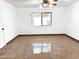 Spacious bedroom with tiled flooring and a bright window at 10223 N 40Th Ave, Phoenix, AZ 85051