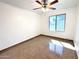Spacious bedroom with tiled flooring and a bright window at 10223 N 40Th Ave, Phoenix, AZ 85051