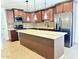 Modern kitchen with stainless steel appliances, granite countertops, and a large island for seating at 10223 N 40Th Ave, Phoenix, AZ 85051