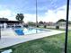 Community pool area with crystal clear water and a surrounding fenced area at 10223 N 40Th Ave, Phoenix, AZ 85051