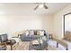 Bright living room showcasing a comfortable sofa, stylish chairs, and modern decor at 10828 N Biltmore Dr # 113, Phoenix, AZ 85029