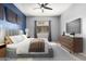 Relaxing bedroom with a plush bed, stylish dresser, and a bright window showcasing neighborhood views at 1225 N 36Th St # 2081, Phoenix, AZ 85008