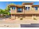 A well-maintained two-story townhome featuring private garages and a balcony at 1225 N 36Th St # 2081, Phoenix, AZ 85008