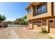 A well-maintained two-story townhome featuring private garages and a balcony at 1225 N 36Th St # 2081, Phoenix, AZ 85008