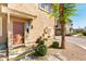 Charming two-story townhome featuring well-kept landscaping, an inviting entryway, and an attractive exterior finish at 1225 N 36Th St # 2081, Phoenix, AZ 85008