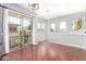 Bright, sunlit room with sliding glass door and multiple windows at 1225 N 36Th St # 2081, Phoenix, AZ 85008