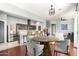 Inviting living space featuring a kitchen island with bar seating and an adjacent dining area at 1225 N 36Th St # 2081, Phoenix, AZ 85008