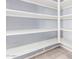 Walk-in pantry with white shelving at 1225 N 36Th St # 2081, Phoenix, AZ 85008