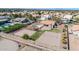 Aerial view showcasing the backyard, pool, patio, sports court, and landscaping at 1289 E Palo Blanco Way, Gilbert, AZ 85296