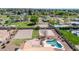 Aerial view showcasing the beautiful yard, pool, volleyball court, and sports court at 1289 E Palo Blanco Way, Gilbert, AZ 85296