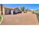 Expansive backyard features gravel ground cover and a storage shed along a side wall at 1289 E Palo Blanco Way, Gilbert, AZ 85296