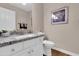 Charming bathroom with a white vanity, granite countertop, and modern fixtures at 1289 E Palo Blanco Way, Gilbert, AZ 85296