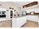 Modern kitchen with a large island, granite countertops, and stainless steel appliances at 1289 E Palo Blanco Way, Gilbert, AZ 85296