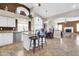 Bright kitchen and dining area with granite countertops and stainless steel appliances at 1289 E Palo Blanco Way, Gilbert, AZ 85296