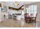 Open-concept kitchen and dining area with modern appliances and ample natural light at 1289 E Palo Blanco Way, Gilbert, AZ 85296