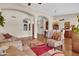 Bright and airy living spaces featuring an open layout, hardwood floors, and elegant furnishings at 1289 E Palo Blanco Way, Gilbert, AZ 85296
