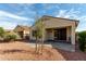 Charming backyard with brick pavers, a small tree and easy access to the house through sliding doors at 12930 W Chapala Dr, Sun City West, AZ 85375