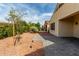 Well-maintained backyard featuring brick pavers, mature trees and a private fence for seclusion at 12930 W Chapala Dr, Sun City West, AZ 85375