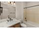 Bathroom with a tub, shower combo, and a white countertop vanity sink at 12930 W Chapala Dr, Sun City West, AZ 85375