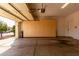 Clean garage featuring built-in cabinets and a well-maintained floor, showcasing functionality at 12930 W Chapala Dr, Sun City West, AZ 85375