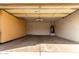 Spacious garage with built-in cabinets for ample storage, offering a clean and organized space at 12930 W Chapala Dr, Sun City West, AZ 85375