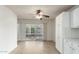 Bright dining area with tile flooring and sliding glass doors leading to outdoor space at 13148 N 21St Ave, Phoenix, AZ 85029