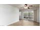 Bright dining area featuring tile flooring and sliding glass doors at 13148 N 21St Ave, Phoenix, AZ 85029