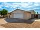 Single level home features a two-car garage and low maintenance desert landscaping at 13148 N 21St Ave, Phoenix, AZ 85029