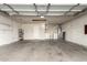 Spacious garage with high ceilings, laundry and utility hookups, and ample storage at 13148 N 21St Ave, Phoenix, AZ 85029