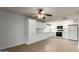 Spacious kitchen with white cabinets, tile floors, and modern appliances at 13148 N 21St Ave, Phoenix, AZ 85029