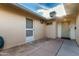 Side view of the house with entry door and adjacent utility door at 13148 N 21St Ave, Phoenix, AZ 85029