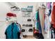 Well-organized walk-in closet with shelving, hanging rods, and ample storage space for clothes, shoes, and accessories at 13630 W Aleppo Dr, Sun City West, AZ 85375