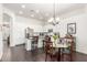 Charming kitchen and breakfast nook with stainless appliances and granite countertops at 14374 W Amelia Ave, Goodyear, AZ 85395