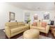 Comfortable living space with hardwood floors and recessed lighting at 14374 W Amelia Ave, Goodyear, AZ 85395