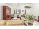 Bright living area with vaulted ceilings, hardwood floors, and ample seating at 14374 W Amelia Ave, Goodyear, AZ 85395